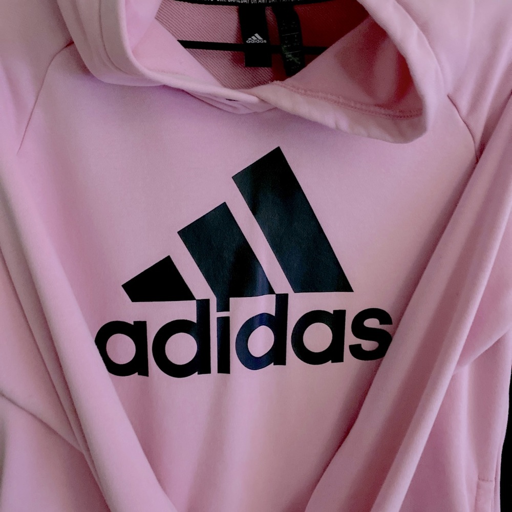 Woman’s pink adidas hoody